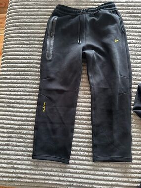 Nike Black Joggers with Yellow Swoosh and NOCTA Detail